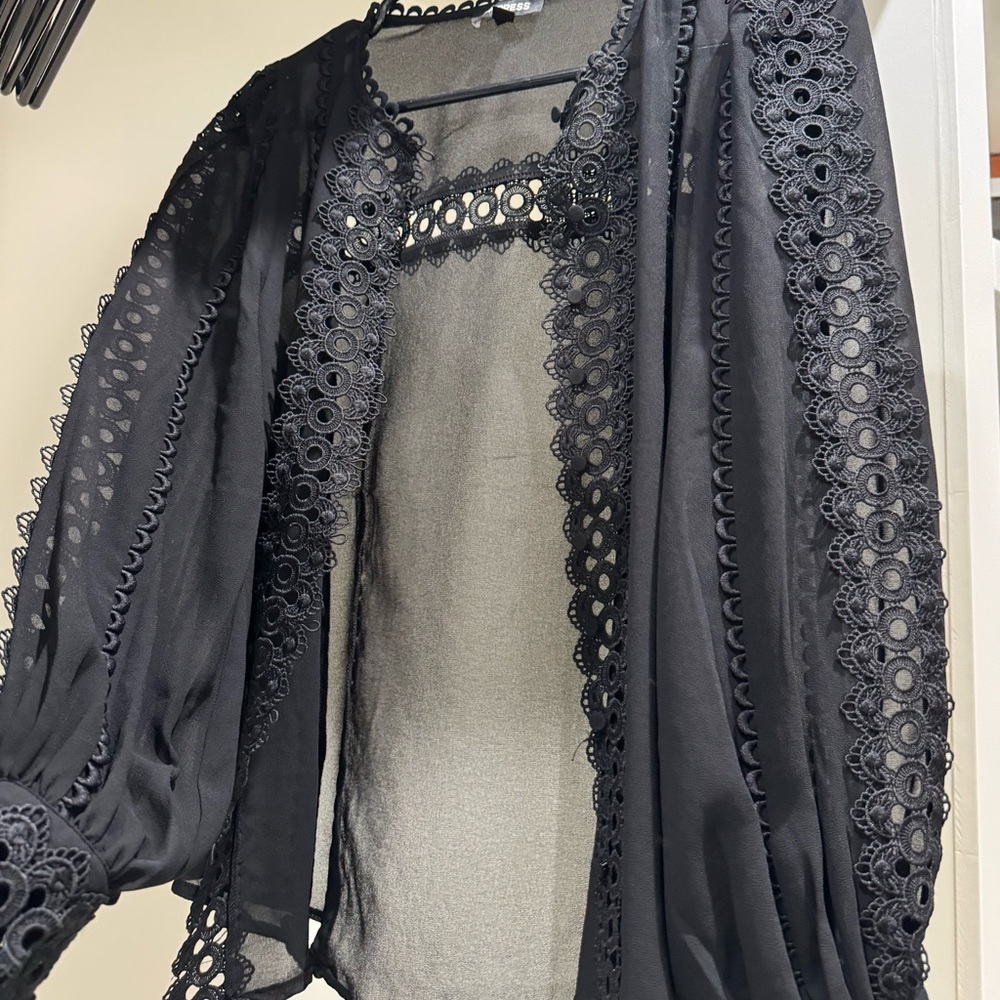 Eyelet Lace Button Up Long Sleeve Top
Color: Pitch Black
Size: S
